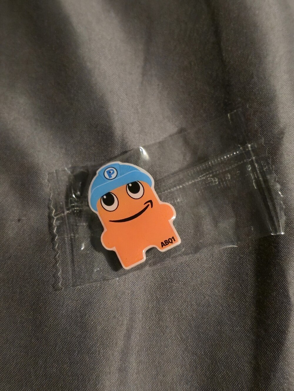 Orange Character Pin with Blue Hard Hat Peccy Pin